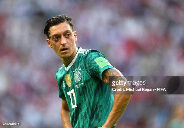 Mesut Oezil of Germany stands dejected following the 2018 FIFA World Cup Russia group F match between Korea Republic and Germany at Kazan Arena on...