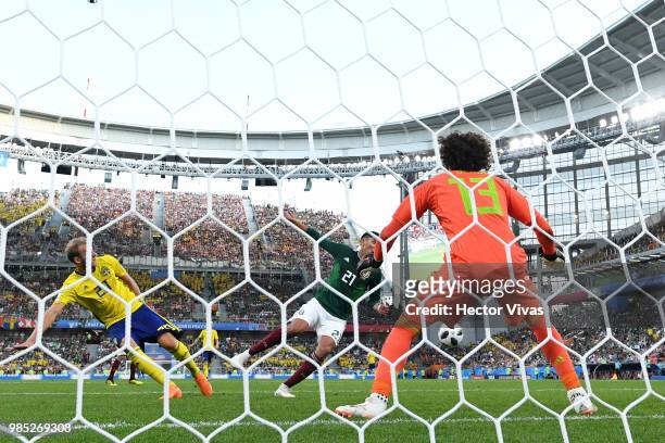 Edson Alvarez of Mexico scores an own goal to put Sweden 3-0 during the 2018 FIFA World Cup Russia group F match between Mexico and Sweden at...