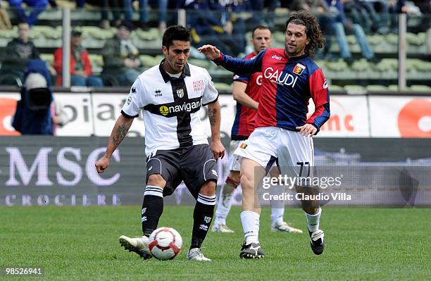 Luis Antonio Jimenez of Parma FC competes for the ball with Omar Milanetto of Genoa CFC during the Serie A match between Parma FC and Genoa CFC at...