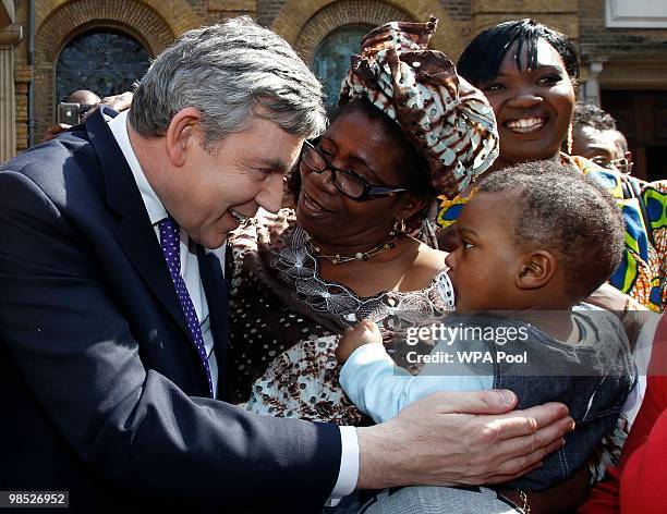 British Prime Minister Gordon Brown speaks to the congregation outside Wesley's Chapel during his campaign tour on April 18, 2010 in London, England....