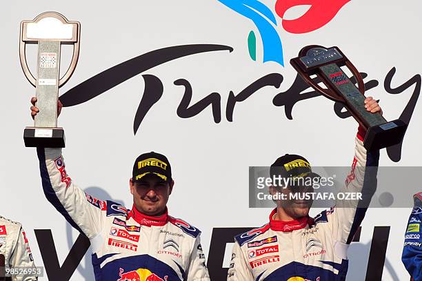 Sebastien Loeb of France and Daniel Elena of Monaco celebrate victory after the third day of the WRC Rally of Turkey 2010 on April 18, 2010 in...