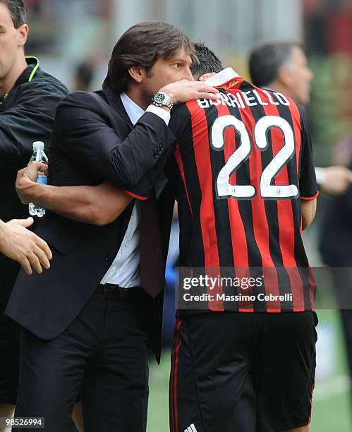 Marco Borriello of AC Milan celebrates after scoring Milan's opening goal with head coach Leonardo during the Serie A match between UC Sampdoria and...