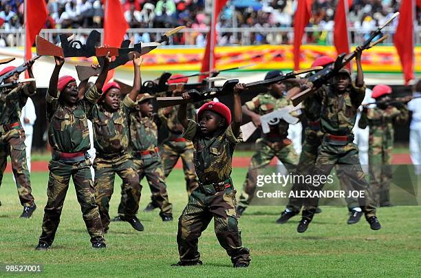 Zimbabwean child cadets parade at Harare National Stadium during celebrations of Zimbabwe's 30 years of independence from Britain, in Harare on April...