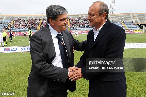 Head coach Giorgio Melis of Cagliari and head coach Delio Rossi of Palermo shake hands before the Serie A match between Cagliari Calcio and US Citta...