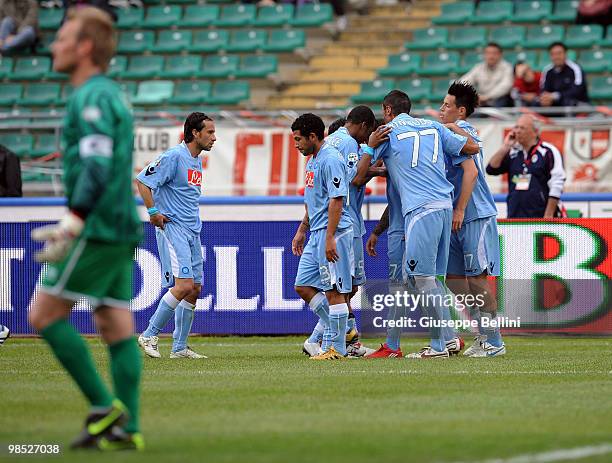 Leandro Rinaudo and Napoli players celebrate with Ezequiel Lavezzi after he scored the opening goal during the Serie A match between AS Bari and SSC...