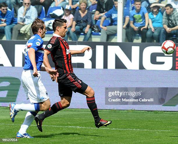 Stefano Lucchini of UC Sampdoria battles fot the ball against Marco Borriello of AC Milan during the Serie A match between UC Sampdoria and AC Milan...