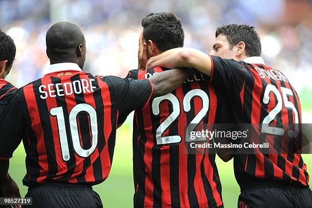 Marco Borriello of AC Milan is congratulated by Clarence Seedorf and Daniele Bonera after scoring Milan's opening goal during the Serie A match...