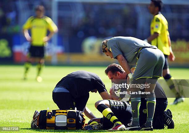 Mohamed Zidan of Dortmund lies injured on the pitch during the Bundesliga match between Borussia Dortmund and 1899 Hoffenheim at Signal Iduna Park on...