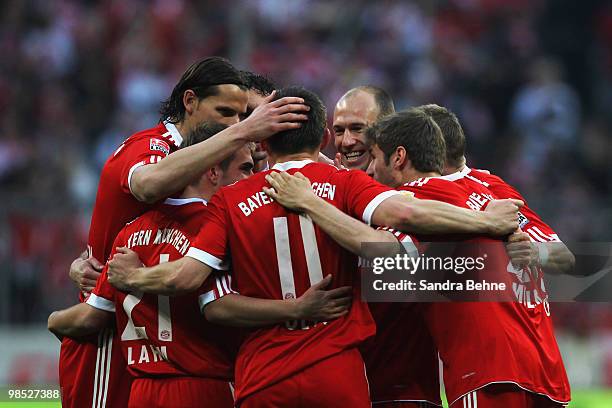 Ivica Olic of Bayern is celebrated by team mates after scoring the fourth goal during the Bundesliga match between FC Bayern Muenchen and Hannover 96...