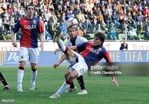 Riccardo Pasi of Parma FC competes for the ball with Alberto Zapater of Genoa CFC during the Serie A match between Parma FC and Genoa CFC at Stadio...