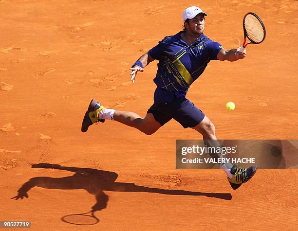Spain's Fernando Verdasco hits a return to his compatriot Rafael Nadal during the Monte-Carlo ATP Masters Series Tournament tennis match final, on...
