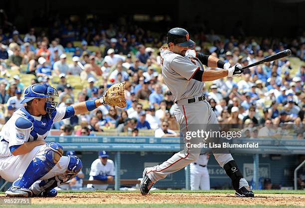 Mark DeRosa of the San Francisco Giants hits a RBI double in the third inning against the Los Angeles Dodgers at Dodger Stadium on April 17, 2010 in...