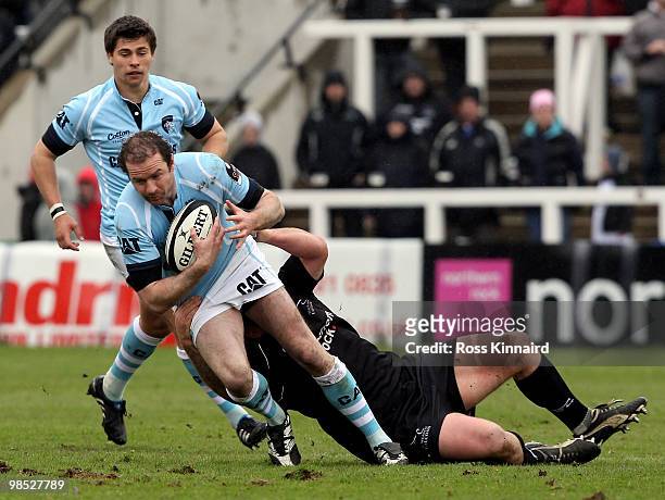 Geordan Murphy of Leicester is tackled during the Guinness Premiership match between Newcstle Falcons and Leicester Tigers at Kingston Park on April...