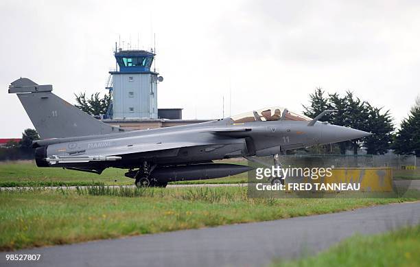 -- File picture dated September 25, 2009 shows a French Rafale fighter jet waiting for take off at the military air base in Landivisiau in western...