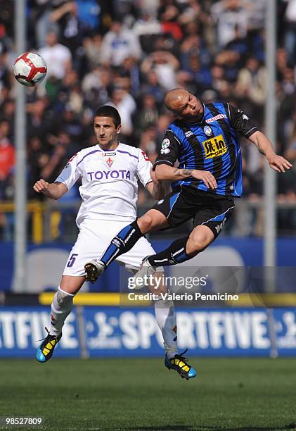 Simone Tiribocchi of Atalanta BC clashes with Alessandro Gamberiniof ACF Fiorentina during the Serie A match between Atalanta BC and ACF Fiorentina...