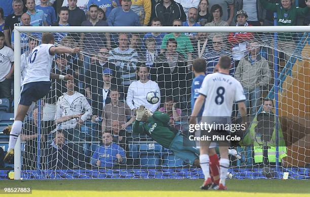 John Carew of Aston Villa has his penalty saved by goalkeeper David James of Portsmouth during the Barclays Premier League match between Portsmouth...