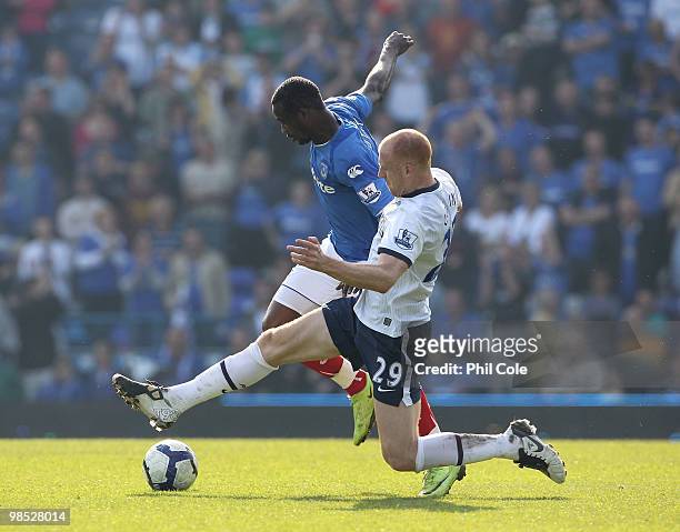 James Collins of Aston Villa challenges John Utaka of Portsmouth during the Barclays Premier League match between Portsmouth and Aston Villa at...
