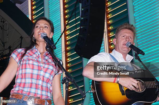 Joey Martin Feek and Rory Feek of Joey + Rory perform on Fremont Street on April 17, 2010 in Las Vegas, Nevada.
