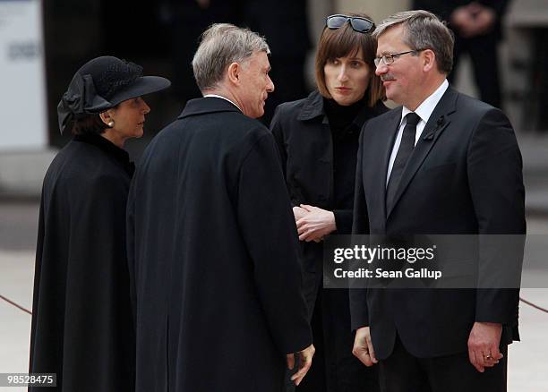 German President Horst Koehler and his wife Eva Luise Koehler express their condolences to acting Polish President Bronislaw Komorowski at the...