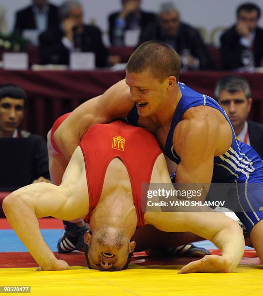 German Jan Fisher competes for the bronze with Ukrainian Anton Babka during men's Free Style Wrestling 84 kg event at the Senior Wrestling European...