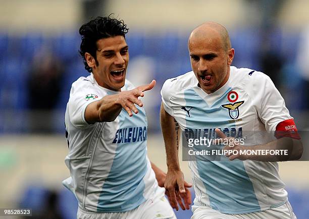 Lazio 's forward Tommaso Rocchi celebrates with teammate Sergio Floccari after scoring against AS Roma during their Serie A football match at Olympic...