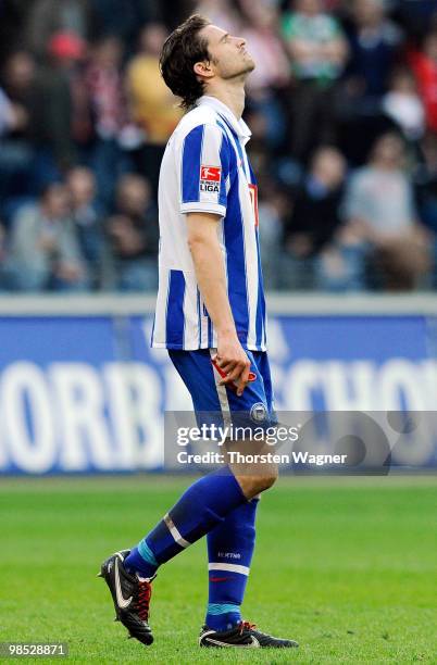 Arne Friedrich of Berlin looks dejected after the Bundesliga match between Eintracht Frankfurt and Hertha BSC Berlin at Commerzbank Arena on April 18...