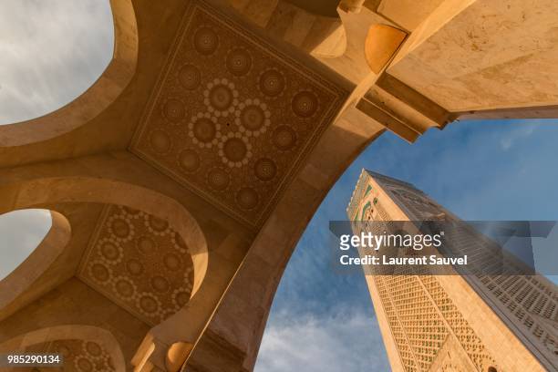 low wide angle view of mosque hassan ii, casablanca, morocco - casablanca morocco stock pictures, royalty-free photos & images