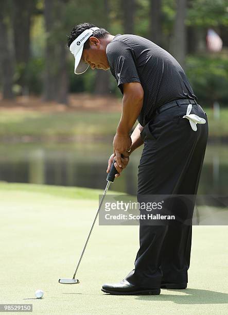 Choi of South Korea hits a putt during the final round of the Verizon Heritage at the Harbour Town Golf Links on April 18, 2010 in Hilton Head...