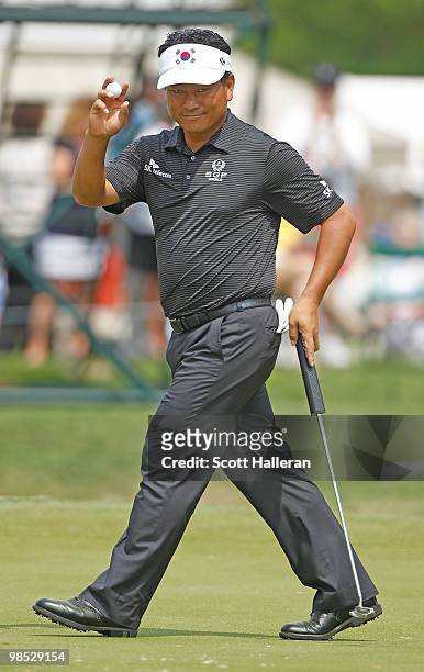 Choi of South Korea walks across a green during the final round of the Verizon Heritage at the Harbour Town Golf Links on April 18, 2010 in Hilton...
