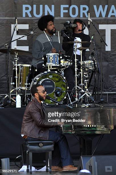 Musicians John Legend and ?uestlove of The Roots performs onstage at the Dow Live Earth Run for Water at Prospect Park on April 18, 2010 in the...
