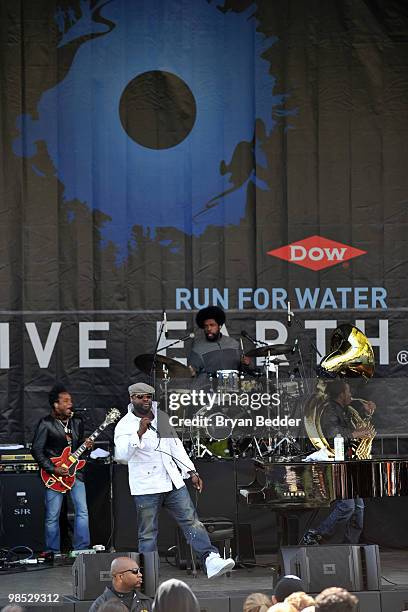 Ben Kenney, Black Thought, ?uestlove and Tuba Gooding Jr. Of The Roots perform onstage at the Dow Live Earth Run for Water at Prospect Park on April...