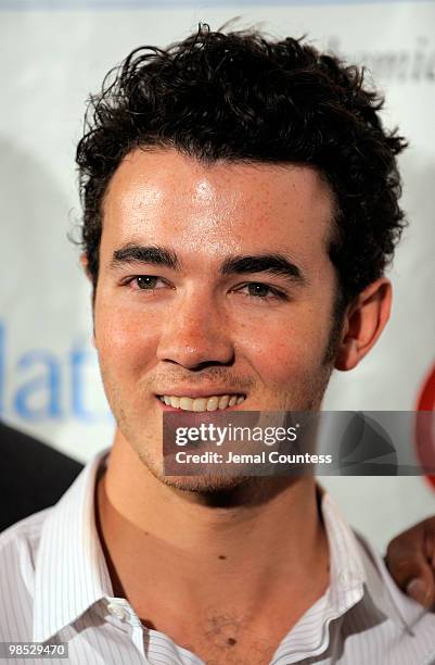 Singer Kevin Jonas poses for a photo backstage at the 11th Annual T.J. Martell Foundation Family Day benefit at Roseland Ballroom on April 18, 2010...
