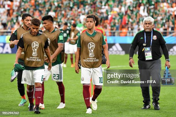Jonathan Dos Santos, Jesus Gallardo and Giovani Dos Santos of Mexico walk off the pitch following the 2018 FIFA World Cup Russia group F match...
