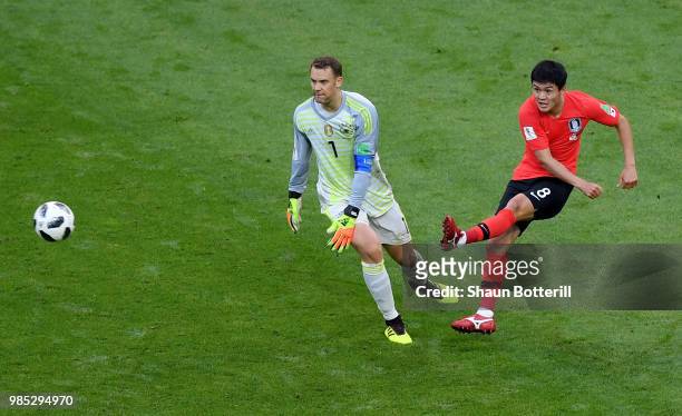 Manuel Neuer of Germany and Ju Se-Jong of Korea Republic compete for the ball during the 2018 FIFA World Cup Russia group F match between Korea...
