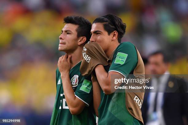 Hirving Lozano and Diego Reyes of Mexico react following the 2018 FIFA World Cup Russia group F match between Mexico and Sweden at Ekaterinburg Arena...