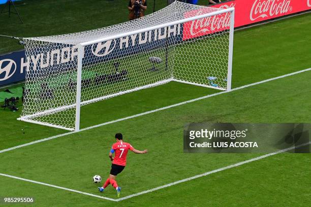 South Korea's forward Son Heung-min scores his team's second goal during the Russia 2018 World Cup Group F football match between South Korea and...