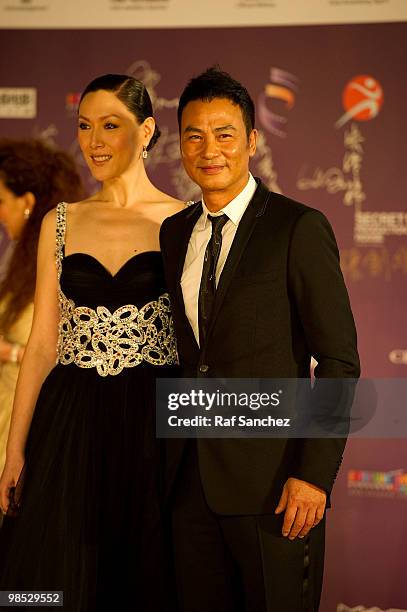 Simon Yam arrives with his wife QiQi at the 29th Hong Kong Film Awards at the The Hong Kong Cultural Centre on April 18, 2010 in Hong Kong, Hong Kong.