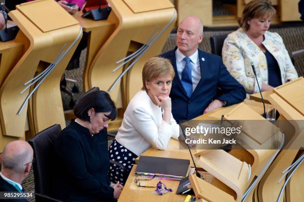 Scotland's First Minister Nicola Sturgeon and front bench colleagues during consideration of the motion to exclude Mark McDonald MSP from the...