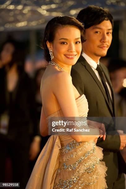 Taiwanese actress Shu Qi arrives with actor Chang Chen at the 29th Hong Kong Film Awards at the The Hong Kong Cultural Centre on April 18, 2010 in...