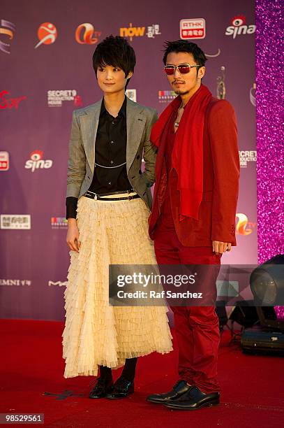 Singer and actress Li Yuchun poses with actor Nicholas Tse at the 29th Hong Kong Film Awards at the The Hong Kong Cultural Centre on April 18, 2010...