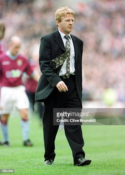 Coventry manager Gordon Strachan leaves the field in dispair during the FA Carling Premier League game between Aston Villa and Coventry City at Villa...