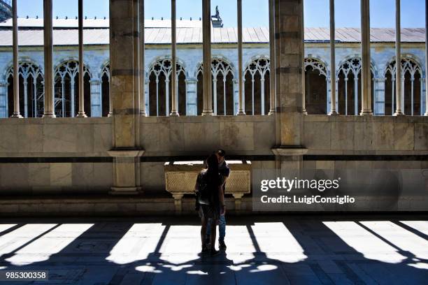 pisa, camposanto, young couple - consiglio stock pictures, royalty-free photos & images