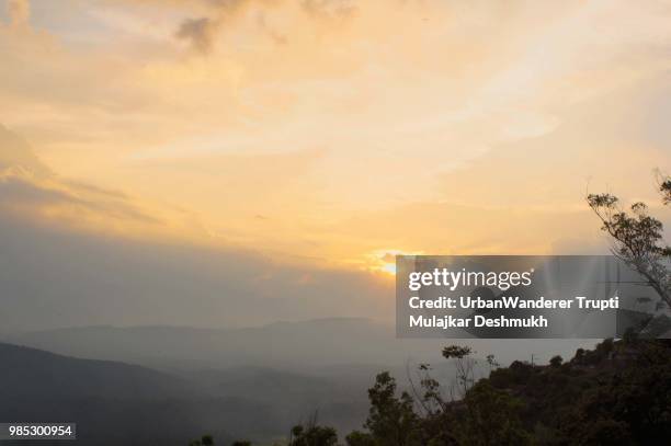 sunset in coorg - coorg stock pictures, royalty-free photos & images