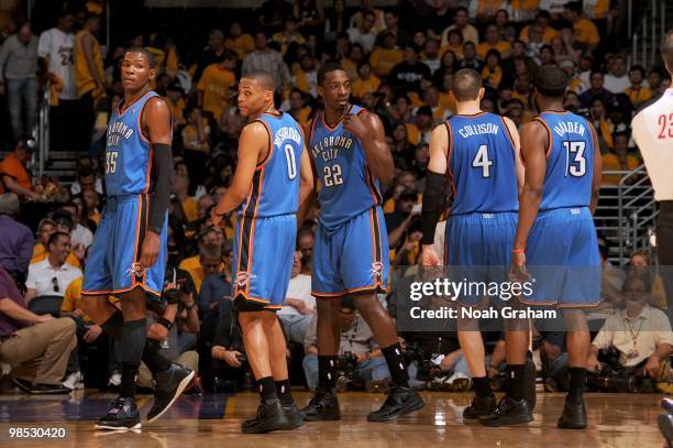 Kevin Durant, Russell Westbrook, Jeff Green, Nick Collison, and James Harden of the Oklahoma City Thunder walk on the court during a game against the...