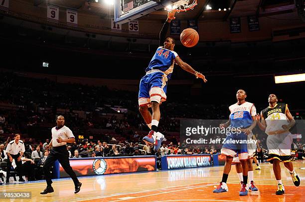 Moore of Suburban Team slams a dunk during his match against City Team during the Regional Game at the 2010 Jordan Brand classic at Madison Square...
