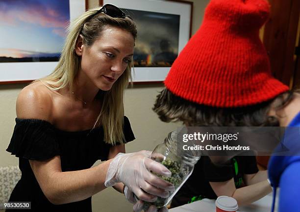 Beatriz Herrera-Rodden shows off some of her marijuana samples at the Cannabis Crown 2010 expo in Aspen, Colorado. Herrera-Rodden runs Soverign...