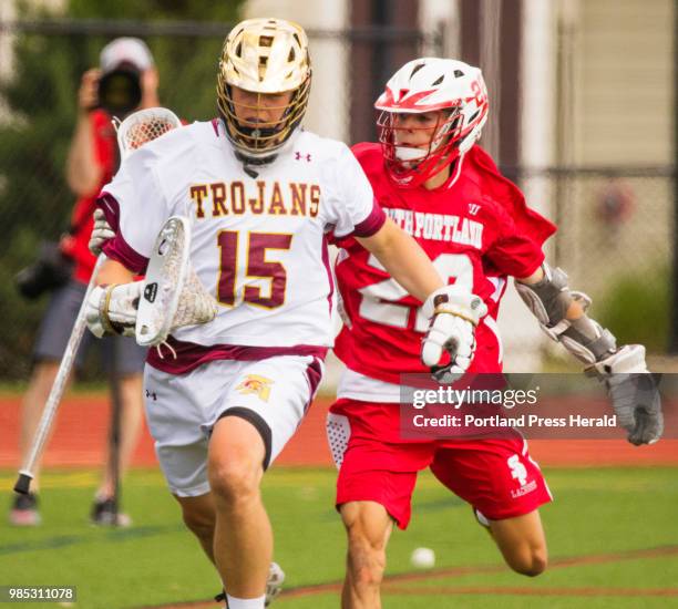 Thornton Academy goalie Ean Patry rushes down the field, late in the game, moments before coming out of the game with a commanding 13-3 lead. South...