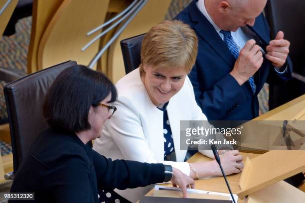Scotland's First Minister Nicola Sturgeon at the end of a debate in the Scottish Parliament after completing a reshuffle of Scottish ministers...