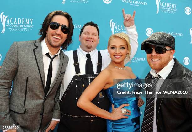 Jake Owen poses with Vinny Hickerson, Crystal Hoyt of the band Trailer Choir at the 45th Annual Academy of Country Music Awards at the MGM Grand...