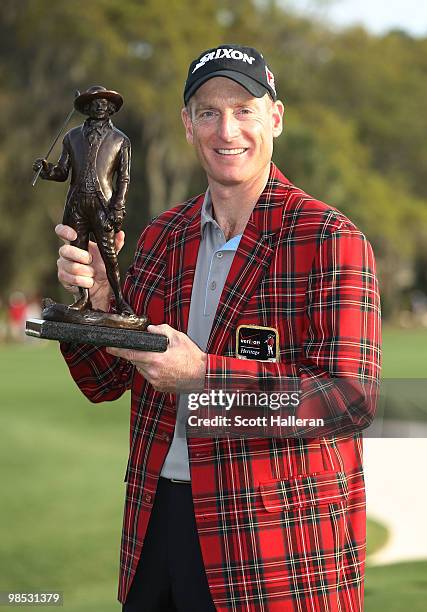 Jim Furyk poses with the trophy after winning the 2010 Verizon Heritage at the Harbour Town Golf Links on April 18, 2010 in Hilton Head lsland, South...